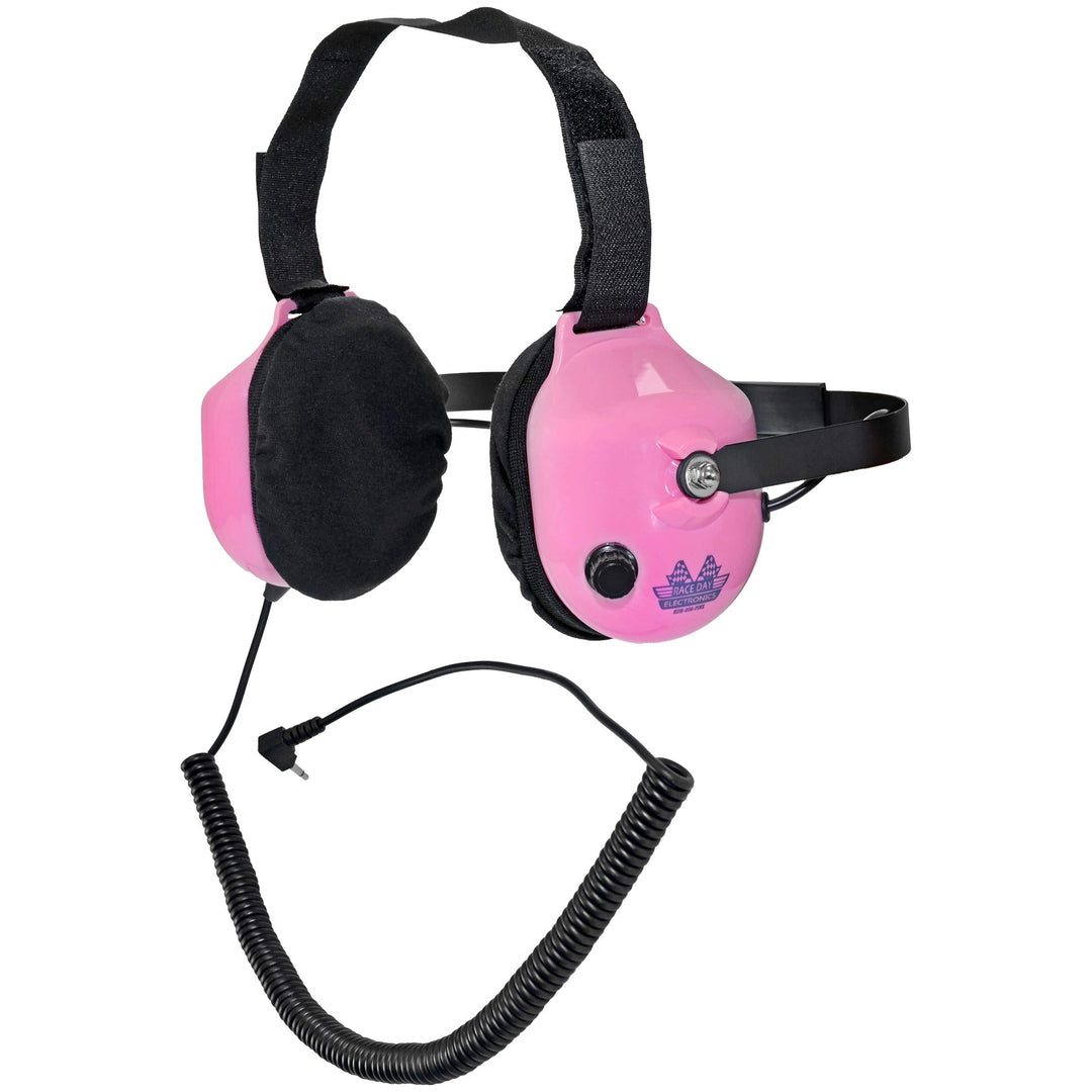 Pink and black ear protection with a coiled cord on a white background