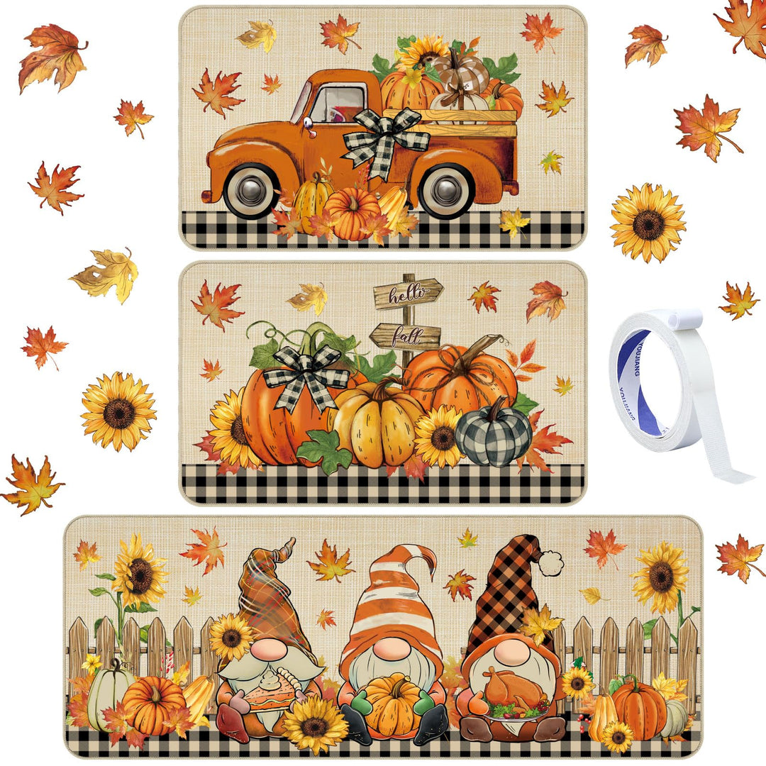 Set of three autumn-themed placemats with pumpkins, gnomes, and a truck, accompanied by decorative tape.