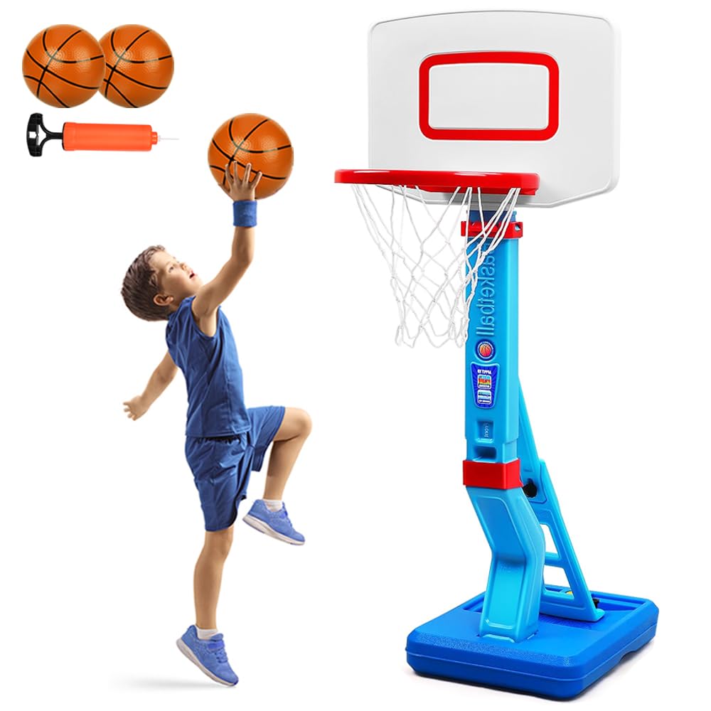 Child playing with a basketball hoop and two basketballs on a white background